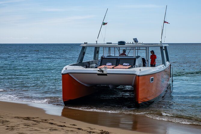 Full Day Luxury Snorkel Charter With Lunch (Minimum 10 Guests) - Reaching the private bay and getting into the water
