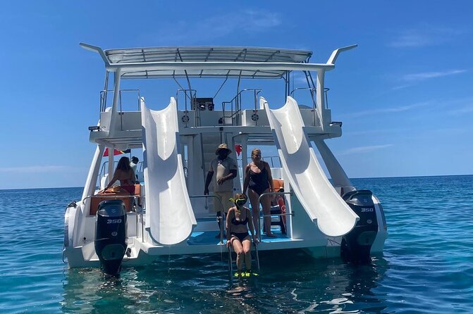 Private Half Day with Waterslide Boat - Guided snorkeling with help in the water