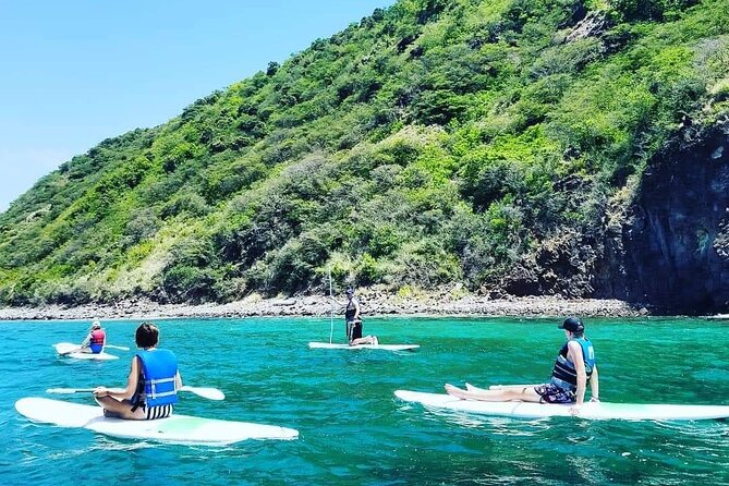 Scenic Stand-up Paddleboarding Adventure Tour - Coastal Caves Viewed from the Water
